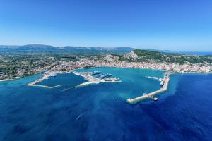 an aerial view of a harbor with boats in the water at Strada Marina Hotel in Zakynthos