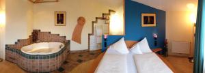 Rúm í herbergi á Hotel Himmelreich