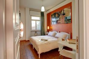 Postel nebo postele na pokoji v ubytování Cento Passi dal Duomo B&B
