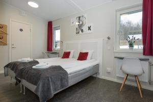 Postel nebo postele na pokoji v ubytování Hotell Eken Mölndal
