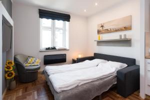 Posteľ alebo postele v izbe v ubytovaní Sunflower Apartment
