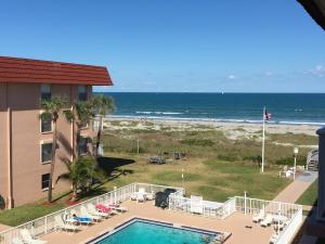 a view of the beach from the balcony of a resort at Spanish Main in Cocoa Beach