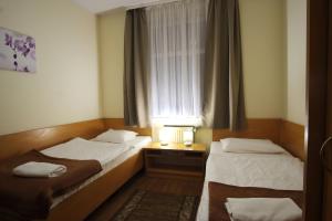 Postel nebo postele na pokoji v ubytování Hotel Miramar + 37 fotografií