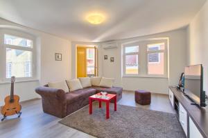 Posezení v ubytování Apartment Spagnolo City