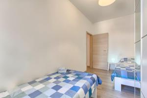 Postel nebo postele na pokoji v ubytování Apartment Spagnolo City