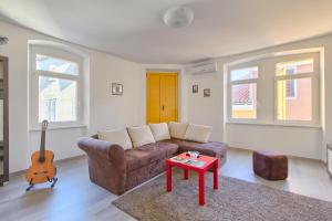 Posezení v ubytování Apartment Spagnolo City