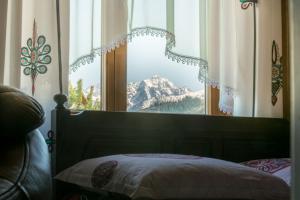 Ліжко або ліжка в номері ECO Villa Karpatia Ski&SPA
