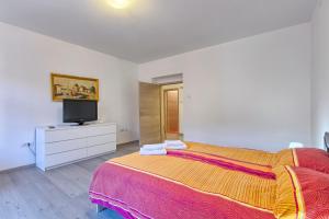 Postel nebo postele na pokoji v ubytování Apartment Spagnolo City