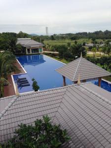 a view of a swimming pool from a roof at Casa Seaside Rayong by Chate in Rayong