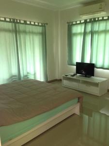 TV a/nebo společenská místnost v ubytování Casa Seaside Rayong by Chate + 4 fotografie