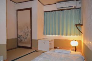 Postel nebo postele na pokoji v ubytování Guesthouse Bon