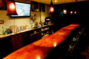 Η κουζίνα ή μικρή κουζίνα στο Naoshima Backpackers Guesthouse