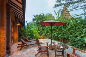 A garden outside The Hotel @ Tharabar Gate