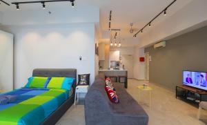 TV a/nebo společenská místnost v ubytování Parkview Service Apartments