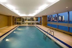 
a large swimming pool in a hotel room at Hyatt Regency Jersey City in Jersey City
