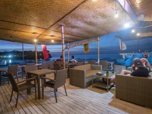 Posezení v ubytování Mushroom Beach Bungalows