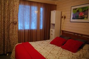 Postel nebo postele na pokoji v ubytování Aneen Loma Vacation and Cottages