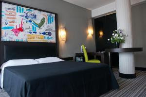 Katil atau katil-katil dalam bilik di Twentyone Hotel