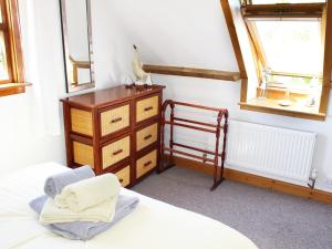 מיטה או מיטות בחדר ב-The Hayloft