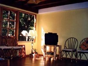 TV a/nebo společenská místnost v ubytování Puma Hostel
