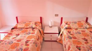 
Кровать или кровати в номере Residenza Alberghiera Italia
