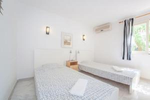 Posteľ alebo postele v izbe v ubytovaní Finca La Siesta - Villa in Betlem, Mallorca