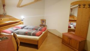 Una cama o camas en una habitación de Hotel Schoberhof