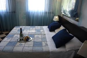 Posteľ alebo postele v izbe v ubytovaní Villa Nina