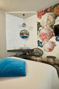Postel nebo postele na pokoji v ubytování 15 Quindici by Serendipity Rooms