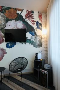 TV a/nebo společenská místnost v ubytování 15 Quindici by Serendipity Rooms