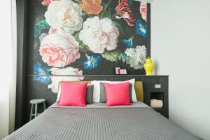 Postel nebo postele na pokoji v ubytování 15 Quindici by Serendipity Rooms