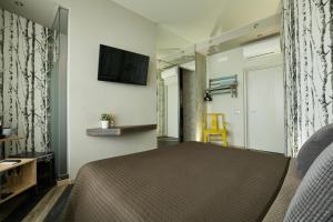 TV a/nebo společenská místnost v ubytování 15 Quindici by Serendipity Rooms