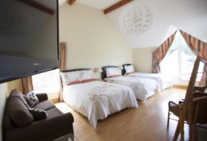 Postelja oz. postelje v sobi nastanitve Wicklow Way Lodge