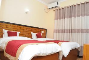 Letto o letti in una camera di Hotel Bagmati