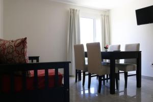 Et tv og/eller underholdning på Breeze Apart Hotel