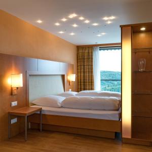 Ένα ή περισσότερα κρεβάτια σε δωμάτιο στο Gasthof Siller