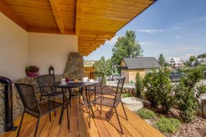 Balkón alebo terasa v ubytovaní Apartamenty Smrekowa Lux Zakopane