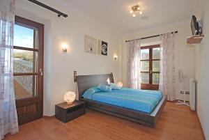 A bed or beds in a room at Villa Canova