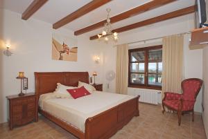 A bed or beds in a room at Villa Canova