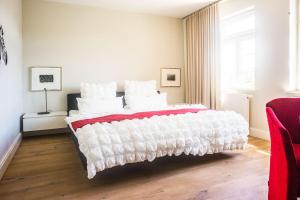Postel nebo postele na pokoji v ubytování Designhotel Rosenbohm