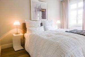 Postel nebo postele na pokoji v ubytování Designhotel Rosenbohm