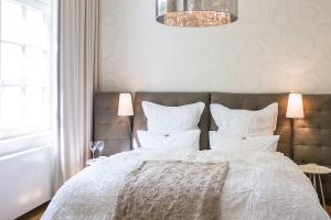 Postel nebo postele na pokoji v ubytování Designhotel Rosenbohm