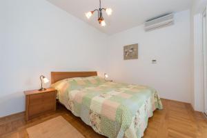 Postel nebo postele na pokoji v ubytování Villa Betina