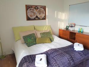 Postel nebo postele na pokoji v ubytování Roskilde B&B
