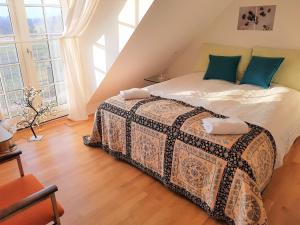 Łóżko lub łóżka w pokoju w obiekcie Roskilde B&B