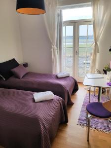 Postel nebo postele na pokoji v ubytování Roskilde B&B