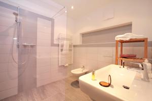 Łazienka w obiekcie Alm Appartements ZellamSee