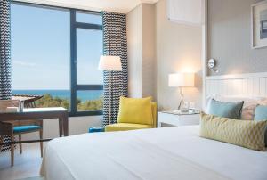 Postel nebo postele na pokoji v ubytování Melody Hotel - an Atlas Boutique Hotel