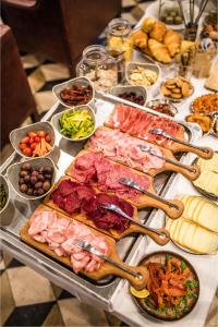 a tray of food on a table at Vander Urbani Resort - a Member of Design Hotels in Ljubljana