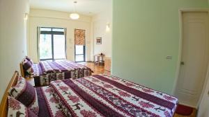 A bed or beds in a room at Hoka in Sanyi